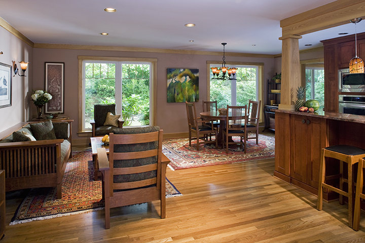 OPEN LIVING ROOM INVITES QUIET SPACE, ALLOWS COMMUNICATION WITH KITCHEN OCCUPANTS, DINING ROOM BEYOND.