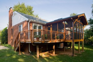 DECK AND SCREEN PORCH NOW ACCESSIBLE THROUGH NEW SLIDING DOORS IN DINING ROOM.