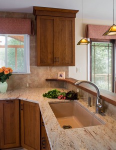 NEW SINK LOCATION CREATES ADDITIONAL WORK SPACE.
