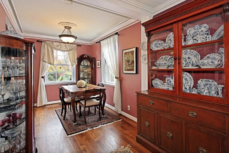 VIEW OF DINING ROOM AND CHINA CABINET